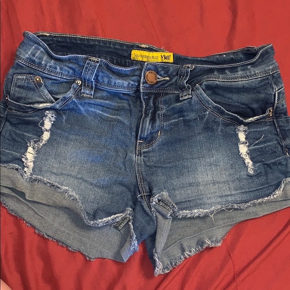 Blue jean roughed-up shorts